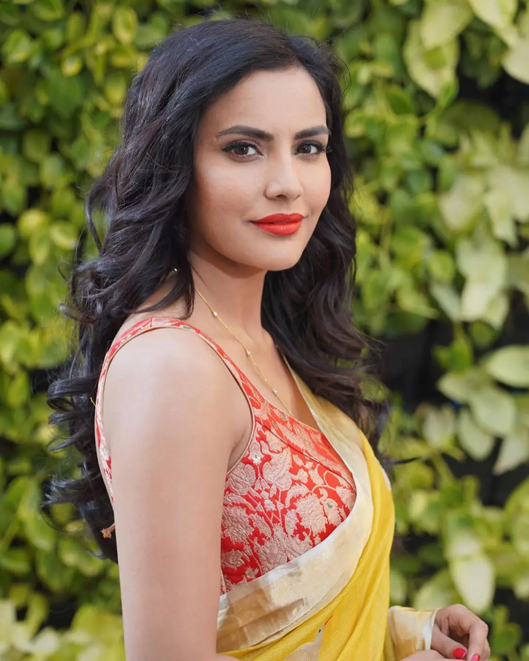 Actress Priya Anand Images in Yellow Color Saree Red Sleeveless Blouse